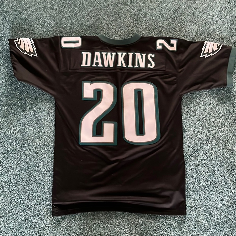 It’s a throwback Eagles jersey a 2004 Brian Dawkins number 20. Size is a large.
